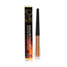 Load image into Gallery viewer, The Hunger Games: The Exhibition Girl on Fire Luminous Liquid Glitter Liner
